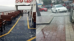 Dolu yağışı sokakları beyaza bürüdü
